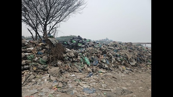 28 acres under HSVP turned into waste site; residents seek transfer to MCG for planned civic infrastructure. (HT)