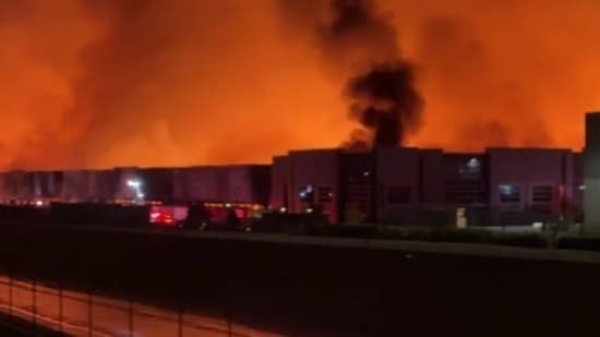 A huge six-alarm fire at a Kimberly-Clark warehouse in Ontario, California, prompted a large firefighting response.