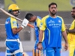 Chennai Super Kings' MS Dhoni, right, during a practice session on the eve of the Indian Premier League (IPL) 2026 cricket match against Punjab Kings