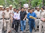 Assam Police, accompanied by Delhi Police, outside the Delhi residence of Congress leader Pawan Khera following an FIR lodged by Assam Chief Minister Himanta Biswa Sarma’s wife Riniki Bhuyan Sharma. Assam Police, accompanied by Delhi Police, outside the Delhi residence of Congress leader Pawan Khera following an FIR lodged by Assam Chief Minister Himanta Biswa Sarma’s wife Riniki Bhuyan Sharma.