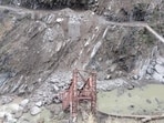 The under-construction bridge over the Ravi river that collapsed after a landslide in Bharmour sub division of Chamba on Tuesday. (HT Photo) The under-construction bridge over the Ravi river that collapsed after a landslide in Bharmour sub division of Chamba on Tuesday. (HT Photo)