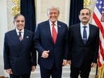 US President Donald Trump (middle) poses for a picture with Pakistan PM Shehbaz Sharif (L) and Field Marshal Asim Munir