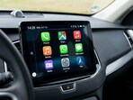 WhatsApp brings a more interactive messaging experience to Apple CarPlay.(AI Generated)