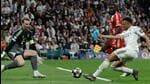Bayern Munich goalkeeper Manuel Neuer blocks a shot by Real Madrid's Kylian Mbappe (R) in their Champions League quarter-final first leg tie at the Santiago Bernabeu Stadium in Madrid on Tuesday. Bayern won 2-1. (AFP)