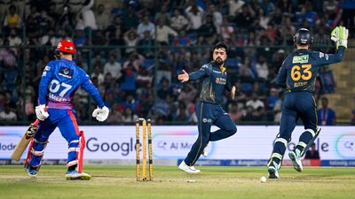 Things began to shift towards GT thanks to a sensational spell from Rashid Khan, who looked like he used to at his very best – which is bad news for the rest of the IPL. Rashid kept things very quiet, and added the scalp of Nitish Rana before removing DC’s form-man Sameer Rizvi with a beautiful googly, for a golden duck. Suddenly, GT were in the ascendancy, as Rashid finished with 3/17. (ANI Photo) Things began to shift towards GT thanks to a sensational spell from Rashid Khan, who looked like he used to at his very best – which is bad news for the rest of the IPL. Rashid kept things very quiet, and added the scalp of Nitish Rana before removing DC’s form-man Sameer Rizvi with a beautiful googly, for a golden duck. Suddenly, GT were in the ascendancy, as Rashid finished with 3/17. (ANI Photo)