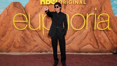 Jacob Elordi kept it simple and classy in a high-collared black suit, paired with matching trousers, a black shirt underneath, and a shiny satin tie. Accessories were minimal, including polished black formal shoes and black sunglasses. (REUTERS)