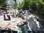 A wall of the Old Hanuman Mandir collapsed in Aliganj, Lucknow, on Thursday. (Deepak Gupta/HT)
