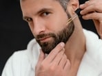 Beard oil is a must for soft and smooth whiskers(Freepik)