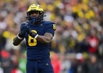 Michigan edge rusher Derrick Moore is gaining attention ahead of the NFL Draft after an impressive senior season.