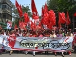 CPI(M) supporters during the Nomination rally for Jadavpur Constituency candidate Bikash Ranjan Bhattacharya at Hazra crossing in Kolkata, West Bengal. CPI(M) supporters during the Nomination rally for Jadavpur Constituency candidate Bikash Ranjan Bhattacharya at Hazra crossing in Kolkata, West Bengal.
