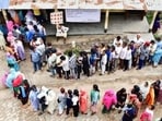 Long queues of voters were seen in polling stations prior to the official start of voting at 7 am. (ANI)