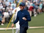 Northern Ireland's Rory McIlroy reacts after holing his putt on the 2nd hole during the first round