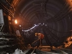 Pune, India - January 18, 2023: A man works in a tunnel near Civil Court underground metro station, in Pune, India, on Wednesday, January 18, 2023. (Photo by Pratham Gokhale/Hindustan Times) (Pratham Gokhale/HT Photo)