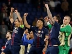Paris St Germain's Marquinhos and Desire Doue celebrate after the match