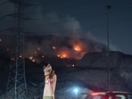 The fire at the landfill in April 2024, following which the court took cognisance of legacy waste at the site. (HT Archive) The fire at the landfill in April 2024, following which the court took cognisance of legacy waste at the site. (HT Archive)