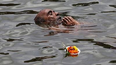 A-devotee-take-a-holy-dip-in-Ram-Kund-on-the-eve-of-the-flag-hoisting-of-Kumbh-Mela-in-Nashik-Arijit-Sen-HT-photo A-devotee-take-a-holy-dip-in-Ram-Kund-on-the-eve-of-the-flag-hoisting-of-Kumbh-Mela-in-Nashik-Arijit-Sen-HT-photo