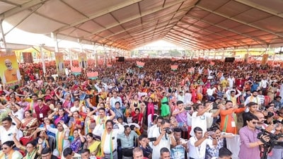 People gather for a public rally in Silchar, Assam, in the run up to the assembly elections. (ANI)