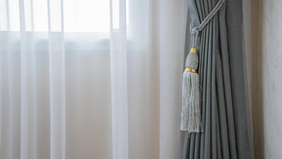Light cotton and sheer curtains filter sunshine through an open window, instantly giving the room a breezy summer feel. (Pexels.com) Light cotton and sheer curtains filter sunshine through an open window, instantly giving the room a breezy summer feel. (Pexels.com)