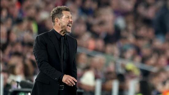 Atletico Madrid's Argentine coach Diego Simeone gestures during the UEFA Champions League quarter final against FC Barcelona. (AFP)