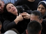A mourner reacts during the funeral of people killed in an Israeli strike that hit a cafe on Wednesday, in Sidon, Lebanon, on April 10. (REUTERS)