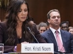 Homeland Security Secretary Kristi Noem, left, and her husband Bryon Noem, right, appears for an oversight hearing before the Senate Judiciary Committee, at the Capitol in Washington, Tuesday, March 3, 2026. Her husband, Bryon Noem, is seated at center. (AP Photo/J. Scott Applewhite)