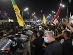 Protesters gather outside the Kuwaiti consulate after rockets fired from the direction of Kuwait hit a house in Khor al-Zubair, Basra, Iraq,