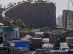 Over 100 acres of land in Andheri West around Gilbert Hill, a 66-million-year-old monolith, are set to be transformed under the Maharashtra government’s recently introduced slum cluster redevelopment scheme.