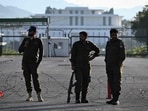 Pakistani police officers stand guard near the President House in the Red Zone area in Islamabad on April 10, 2026. 