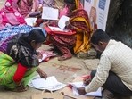 People wait to submit petitions before the Special Tribunal after their names were deleted from the Special Intensive Revision final voter list in West Bengal. (PTI)