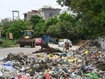 Under the new rules, dumping waste on roads, drains, rivers, water bodies, wetlands, lakes, panchayat land and other public or government-owned spaces has been strictly prohibited. (HT Archive) Under the new rules, dumping waste on roads, drains, rivers, water bodies, wetlands, lakes, panchayat land and other public or government-owned spaces has been strictly prohibited. (HT Archive)