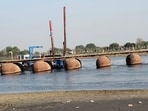 Officials said boat collided with a floating pontoon left behind after a bridge was dismantled recently. Officials said boat collided with a floating pontoon left behind after a bridge was dismantled recently.