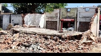 A Roof collapsed at Amloh Road in Khanna suddenly during demolition work, trapping a labourer under the debris on Friday. (HT File)
