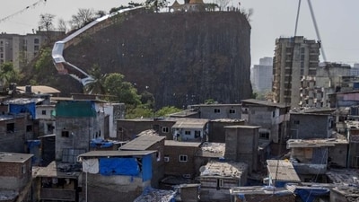 Over 100 acres of land in Andheri West around Gilbert Hill, a 66-million-year-old monolith, are set to be transformed under the Maharashtra government’s recently introduced slum cluster redevelopment scheme. (HT_PRINT) Over 100 acres of land in Andheri West around Gilbert Hill, a 66-million-year-old monolith, are set to be transformed under the Maharashtra government’s recently introduced slum cluster redevelopment scheme. (HT_PRINT)