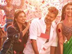 Mamitha Baiju along with Vijay and Pooja Hegde in a still from Jana Nayagan song Thalapathy Kacheri.