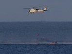 A helicopter lifts one of the astronauts from Artemis II after splashdown in the Pacific Ocean off the coast of California, Friday, April 10, 2026. (Joel Kowsky/NASA via AP) A helicopter lifts one of the astronauts from Artemis II after splashdown in the Pacific Ocean off the coast of California, Friday, April 10, 2026. (Joel Kowsky/NASA via AP)