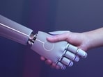 Robot handshake human background, futuristic digital age (rawpixel.com / Benjamas)