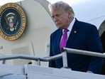 Trump's H-1B visa program changes have created challenges for small employers, with a $100,000 fee hindering hiring in critical sectors. (Photo by Jim WATSON / AFP)