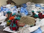 Women workers busy packing Aonla products in Pratapgarh. (HT PHOTO)