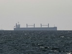 A cargo ship in the Gulf, near the Strait of Hormuz, as seen from northern Ras al-Khaimah, near the border with Oman’s Musandam governance