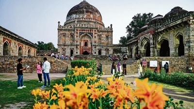 Visitors soak in the history and quiet charm of the Bada Gumbad at Lodhi Garden. (Photo: PTI)
