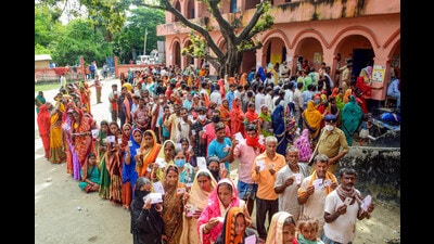 People stand in queues to cast their votes in the Bihar Panchayat elections 2021 in Hajipur. (PTI) People stand in queues to cast their votes in the Bihar Panchayat elections 2021 in Hajipur. (PTI)