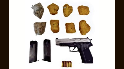 Police seized 6.5 kg of heroin, a .30-calibre pistol with six live cartridges, and ₹1 lakh in suspected drug money. (HT) Police seized 6.5 kg of heroin, a .30-calibre pistol with six live cartridges, and ₹1 lakh in suspected drug money. (HT)