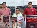 Mother of Sahil along with others during a protest demanding justice at Jantar Mantar, in New Delhi on Sunday. (ANI photo)