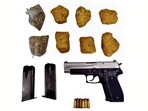 Police seized 6.5 kg of heroin, a .30-calibre pistol with six live cartridges, and  <span class='webrupee'>₹</span>1 lakh in suspected drug money. (HT)