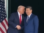 President Donald Trump and Chinese President Xi Jinping shake hands after their US-China summit meeting at Gimhae International Airport in Busan, South Korea on October 30, 2025.