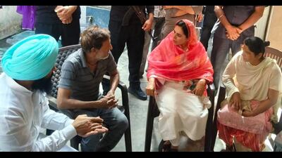 Amrita Warring, wife PPCC chief Amarinder Singh Raja Warring, along with others , meeting family members of a murder victim in Ludhiana on Sunday. (HT Photo) Amrita Warring, wife PPCC chief Amarinder Singh Raja Warring, along with others , meeting family members of a murder victim in Ludhiana on Sunday. (HT Photo)