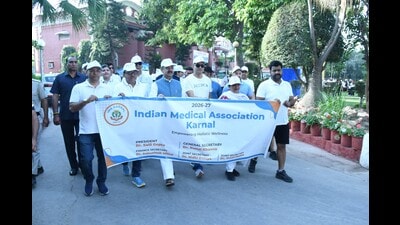 Haryana assembly speaker Harvinder Kalyan during the walkathon in Karnal on Sunday. (HT Photo)