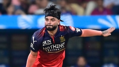 Suyash Sharma picked up the wicket of Ryan Rickelton and Tilak Varma in the same over, punching the real hole in the chase. (Anshuman Poyrekar/HT Photo)