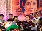 Asha Bhosle was laid to rest with full state honours in Mumbai on Monday. 