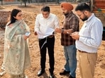MC commissioner and other officials taking stock of the ongoing works in industrial area on Sunday. (HT File)